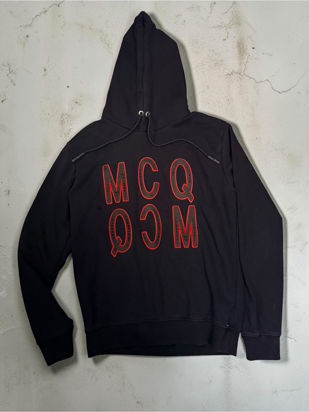 McQ by Alexander McQueen Black Hoodie with Red Logo Print